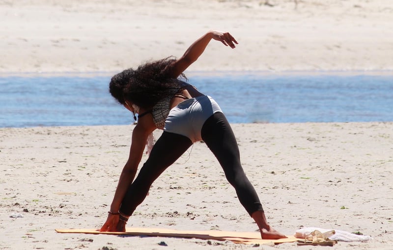 Woman stretching during Pilates